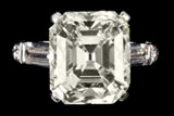 Impressive 9.90 carat Platinum and Diamond Ring, centering on one emerald cut diamond (est. $80,000-$100,000).