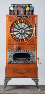Caille Puck 5-cent upright slot machine with music, pre-1900, stocked with great American tunes, plays well. Estimate: $18,000-$22,000. Morphy Auctions image.