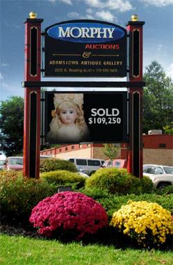 This electronic sign stands in front of Dan Morphy Auctions’s current facility, seen in background. Dan Morphy Auctions image.