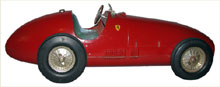 1950s Toschi Ferrari, original windup motor, retains original box. Mosby & Co. image.