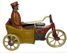 Diminutive circa-1925 German tin motorcycle made by CKO, one of more than 50 penny toys in the sale. Mosby & Co. image.