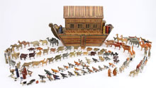 Circa-1870 Erzgebirge (Germany) ark with painted-straw marquetry designs, more than 200 passengers including six people and 61 pairs of animals, 23 pairs of birds; 22 inches long, estimate $4,000-$6,000. Noel Barrett image.