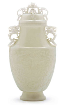 White jade vase with cover, 10 inches tall, ovoid with lion-form finial, sold through LiveAuctioneers.com for $22,320. Image courtesy Leslie Hindman Auctioneers.