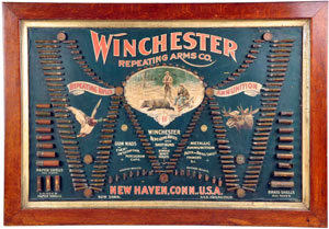 Winchester Repeating Arms advertising board displaying various types of shells and ammunition. Estimate $15,000-$25,000. Morphy Auctions image.