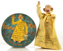 Lot of two Yellow Kid items including Ginger Wafer tin and puppet/doll on stand with celluloid cigarette pin attached to gown, $10,350. Morphy Auctions image.
