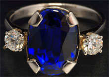 14K white gold ring with 4.37-carat deep blue oval sapphire and diamonds weighing 0.36 carats. Estimate $4,000-$8,000. Morphy Auctions image.