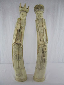 Chinese carved ivory emperor and empress. Don Presley Auctions image.