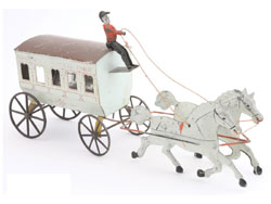 George Brown painted-tin horse-drawn omnibus stenciled “Broadway & Central Park,” $12,980. Noel Barrett Auctions image.