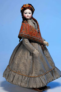 1872 French bisque poupee by Bru Jeune et Cie., 16 inches with ‘E’ mark, $3,737. Image by Frasher’s Doll Auctions.