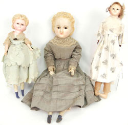 A trio of antique wax dolls. Stephenson’s Auction image.