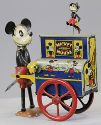 Distler Mickey Mouse Hurdy Gurdy with miniature dancing Minnie Mouse, $8,050. Bertoia Auctions image.