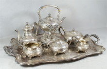 1908 Dominick & Haff engraved and repousse sterling silver teaset. William H. Bunch Auctions image.