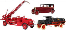 From the Jay Kaufman collection, three of more than 80 pressed-steel trucks and vehicles. Old Town Auctions image.