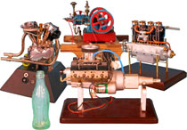 A collection of miniature working engines includes hit-and-miss style engines, and engines for a Harley-Davidson "Knucklehead" and Chevy small block V8. Old Town Auctions image.
