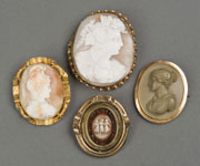 Four examples from a large selection of rare antique cameos. Quinn’s Auction Galleries image.