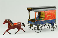 Circa-1870s Fallows American hand-painted tin wagon advertising ‘Fancy Goods, Toys & Notions,’ $10,350. Bertoia Auctions image