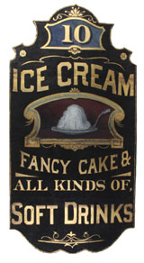Painted tin on wood sign advertising confections and beverages, 5ft. tall, top lot of the sale at $46,000. Noel Barrett Auctions image.