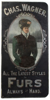 19th-century, full-color wood sign advertising Chas. F. Wagner Furs, $26,450. Noel Barrett Auctions image.