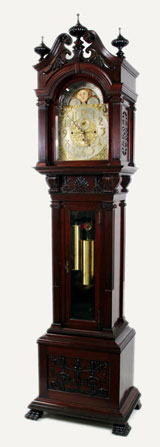 Late-19th-century Tiffany & Co. carved mahogany grandfather clock, 100 in. tall, with Winterhalder & Hofmeier German movement, sun/moon dial, eight bells, Westminster chimes. Est. $3,000-$5,000. Nest Egg Auctions photo