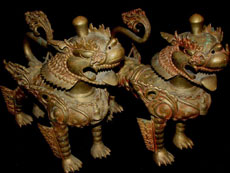 Pair of large, bronze foo dogs, Estate of Dr. Caldwell Titcomb. Tonya A. Cameron Auctioneers image.