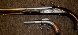 (Top) 1880s-era Turkish flintlock pistol and (bottom) Allen Thurber & Co. pocket pistol with an 1845 patent. Tonya A. Cameron Auctioneers image.