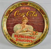 1900 Coca-Cola serving tray featuring the soft drink company’s first model, Hilda Clark; 9½ in. diameter. Est. $2,000-$3,500. Morphy Auctions image.