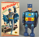 1966 battery-operated walking Batman toy, tin with vinyl head and original cloth cape, original box. Est. $4,000-$8,000. Morphy Auctions image.