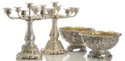 From a superb selection of extensively chased and embossed Tiffany & Co. silver, a pair of circa-1882 nine-light candelabra with triton, seahorse and mermaid motif, est. $40,000-$60,000; and a pair of circa-1882 center bowls, est. $40,000-$60,000. Morphy Auctions image.