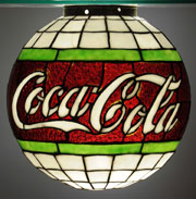 Leaded-glass Coca-Cola hanging globe with 200 glass panels, late teens to early 1920s, est. $12,000-$18,000. Morphy Auctions image.