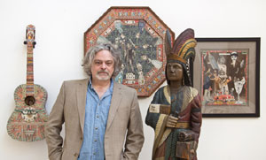 Material Culture’s founder/owner George Jevremovic with a few of his May 5 debut auction’s predicted top lots, including a 19th-century Samuel Robb cigar store figure, est. $40,000-$60,000. Material Culture image.