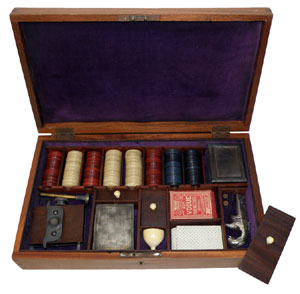 Cased circa-1870 faro set, includes engraved Moore’s patent Derringer. Mosby & Co. image.
