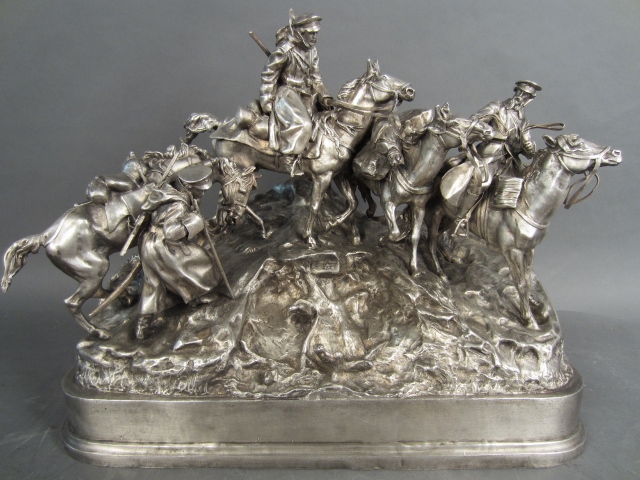 After Evgeny Alexandrovich Lanceray, Russian (1848-1886), ‘Don Cossacks Crossing The Balkans,’ silver over bronze. Sterling Associates image.