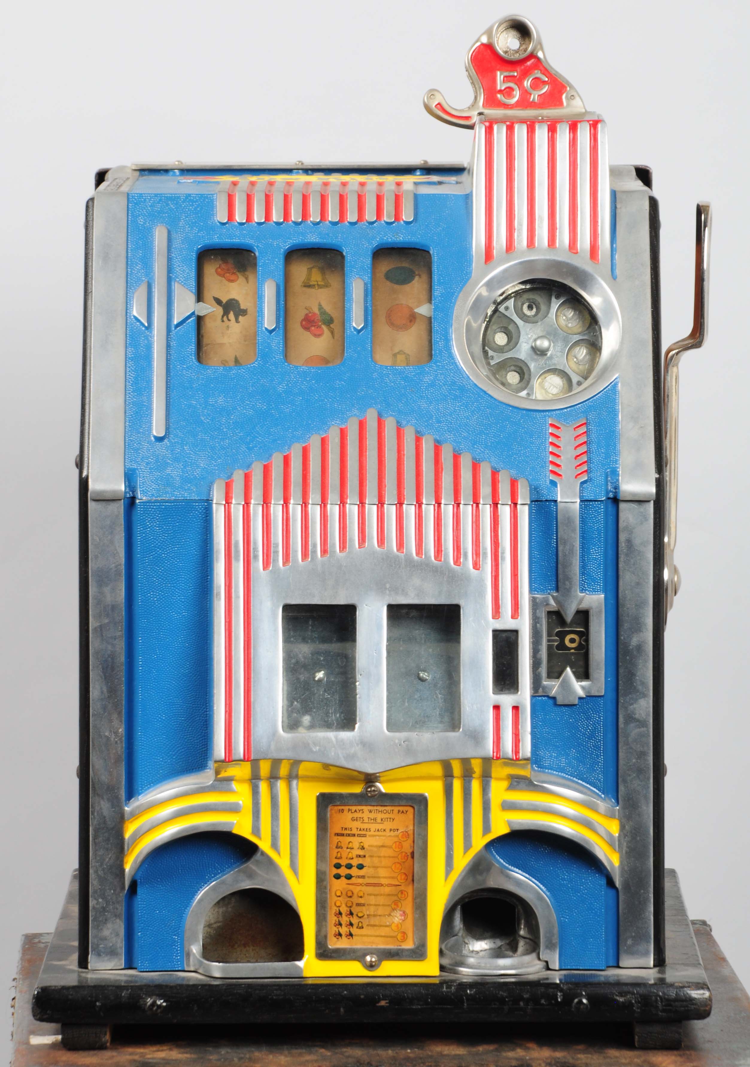 Pace’s “Kitty” slot machine in vibrant primary colors on metal, $7,200. Morphy Auctions image.